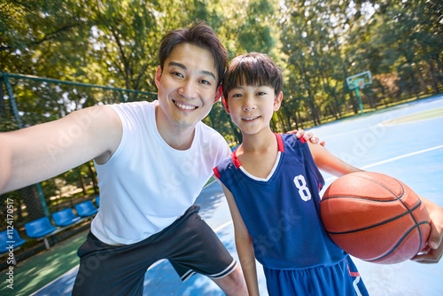 Chinese Coach and Boy Taking Selfie