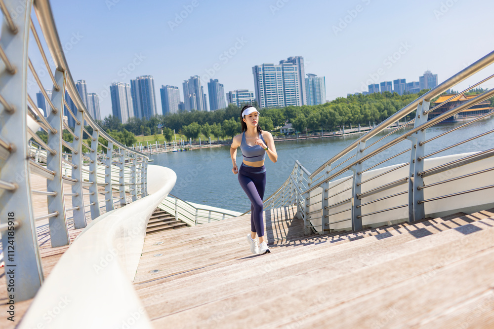 Young Chinese woman exercising in a park Young Chinese woman exercising in a park
