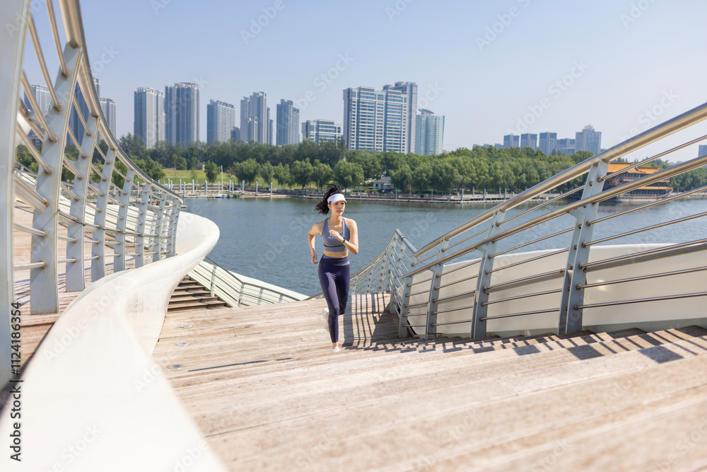 Young Chinese woman exercising in a park Young Chinese woman exercising in a park