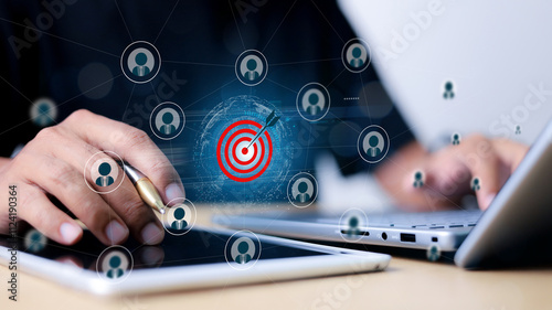 Red dartboard and red arrow connection linkage with human icon for customer focus target group and customer relation management concept.