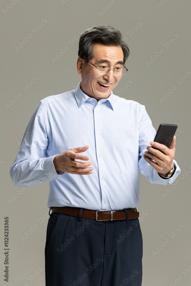 Senior male entrepreneur with smart phone Senior male entrepreneur with smart phone