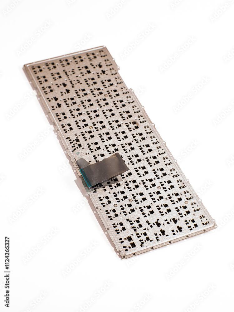 broken laptop keyboard that has been replaced by a new one, damage to the flexible cable. broken laptop keyboard that has been replaced by a new one, damage to the flexible cable.