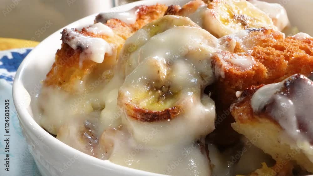 Making one of the coziest desserts, banana bread pudding from scratch. Bananas, eggs, milk and sugar make a delicious dessert. Making one of the coziest desserts, banana bread pudding from scratch. Bananas, eggs, milk and sugar make a delicious dessert.