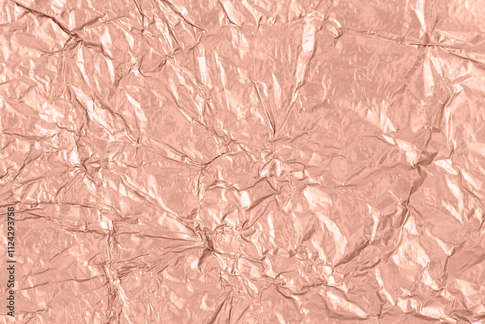 Fototapeta premium Background of crumpled mocha mousse color metal foil