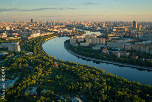 High buildings of Moscow-City at Moskva River at summer sunset, Russia. Moscow-City is business district in Moscow. Panorama of modern office buildings at summer sumset, Moscow downtown in summer.