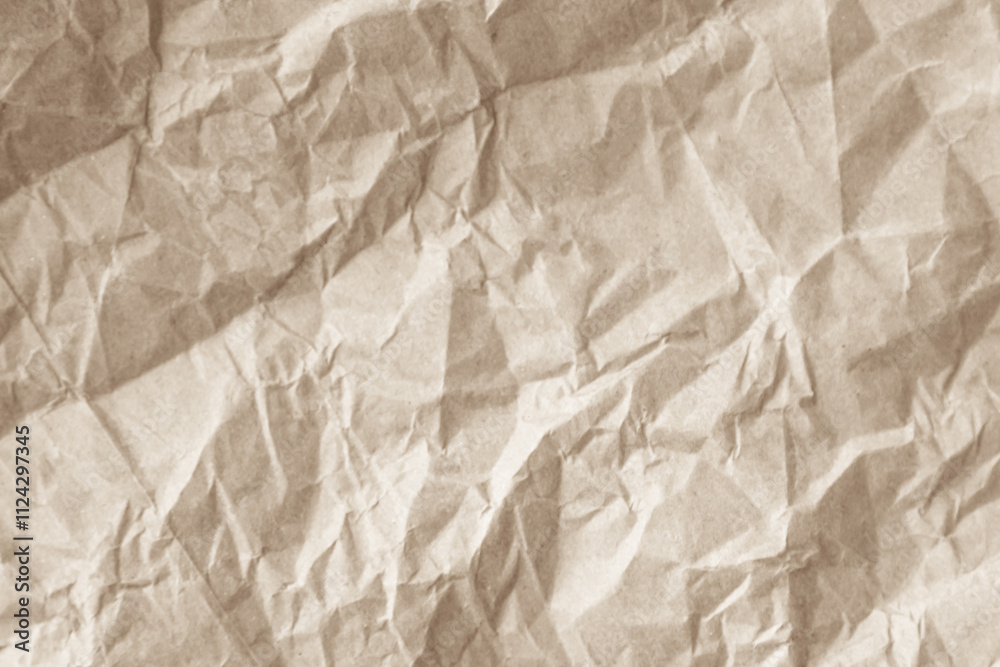 Fototapeta premium Crumpled brown paper texture background for design with copy space for text or image. 