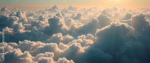 Majestic aerial view, fluffy cumulus clouds, golden sunlight, heavenly sky, panoramic cloudscape