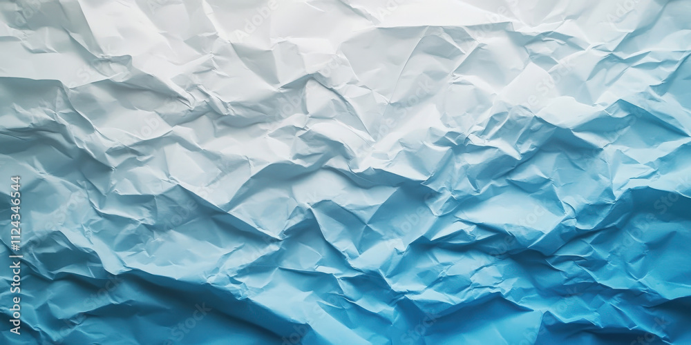 Obraz premium Textured Crumpled Paper Background in Soft Blue Gradients for Elegant Design Projects and Creative Uses in Visual Media and Artworks