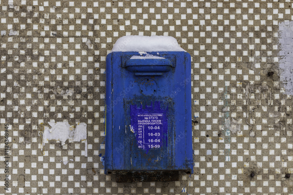 Old Russian blue mailbox. Inscription: Federal state unitary enterprise Russian post. Inscription: the letters are made: Monday. Tuesday. Environment. Thursday. Friday. It's Saturday. Sunday Old Russian blue mailbox. Inscription: Federal state unitary enterprise Russian post. Inscription: the letters are made: Monday. Tuesday. Environment. Thursday. Friday. It's Saturday. Sunday