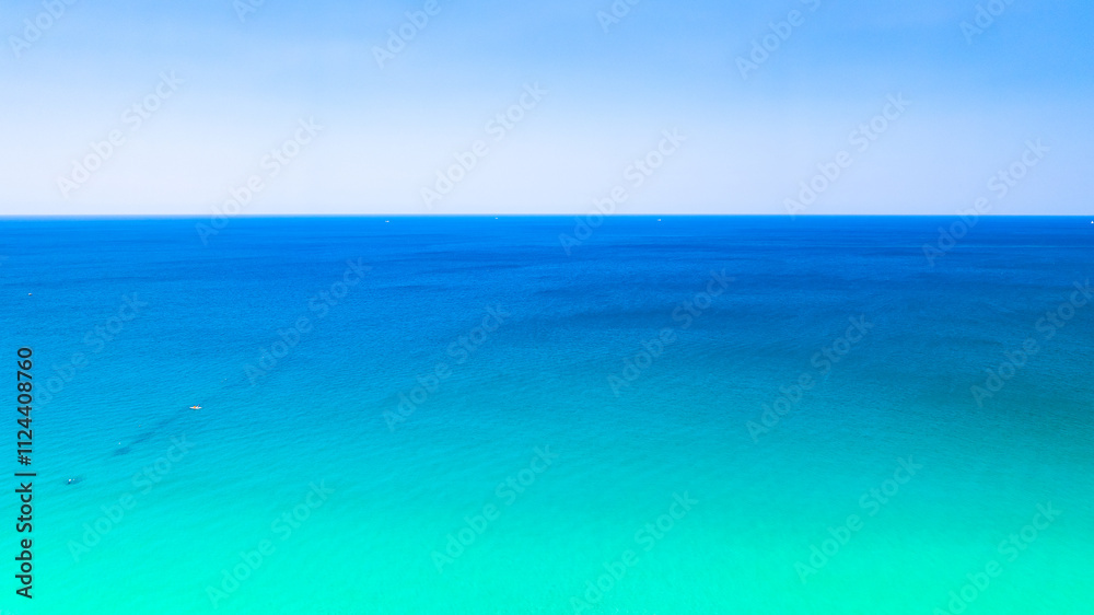 Fototapeta premium Sea surface aerial view,Bird eye view photo of small waves texture water surface turquoise sea background,Beautiful sea nature, Amazing view waves background