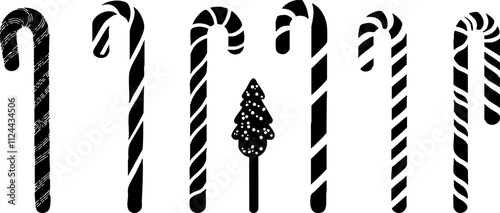A collection of black and white candy canes and a decorative tree, perfect for Christmas-themed designs and holiday graphics.
