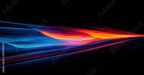 Speed of Light: Abstract streaks of vibrant red, orange, and blue light trails blur across a dark highway, symbolizing rapid movement, velocity, and technological advancement.