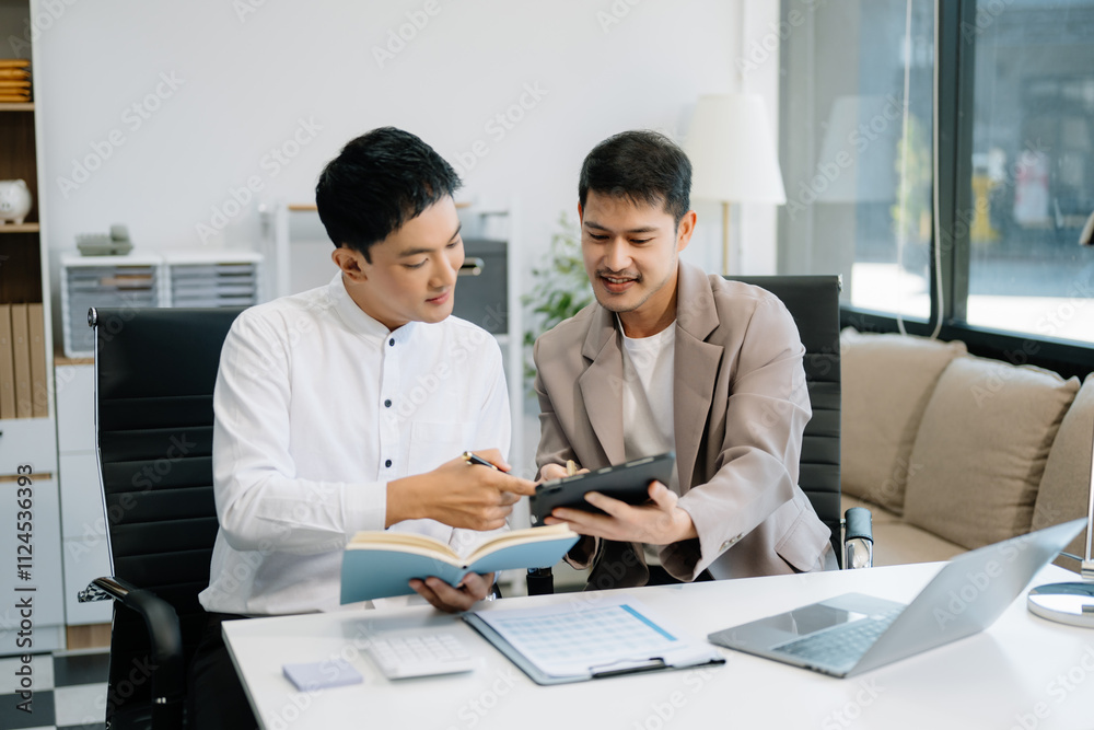 Businessmen work and discuss their business plans. A Human employee explains Businessmen work and discuss their business plans. A Human employee explains