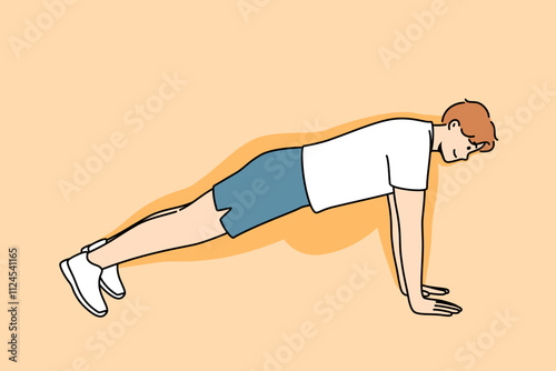 Man doing push-ups makes progress in losing weight, and feels disappearance of thanks to fitness and sports. Guy demonstrates correct execution of push-ups from floor to achieve result