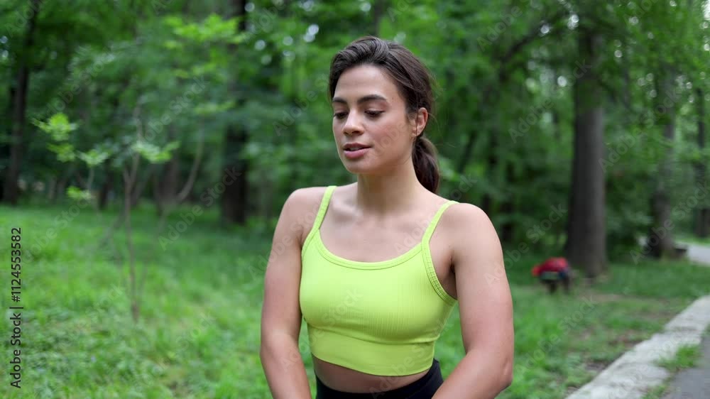 Beautiful woman doing yoga surrounded by greenery Beautiful woman doing yoga surrounded by greenery