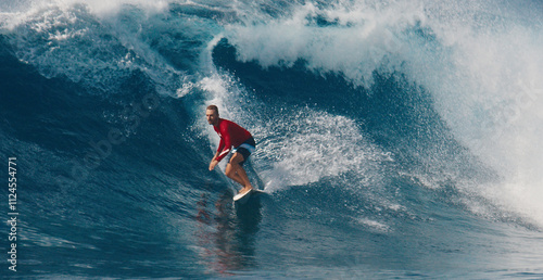 Pro surfer rides big wave in the Maldives
