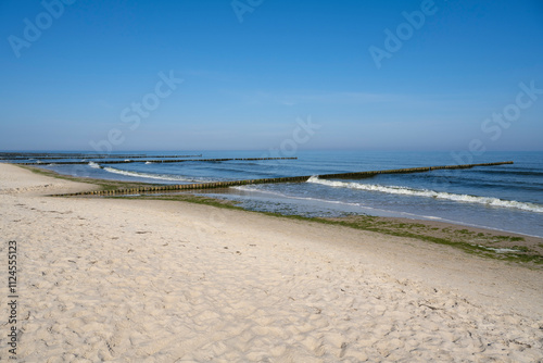 Sand beach with groin at the Baltic Sea in Koserow, Usedom Island, Germany photo