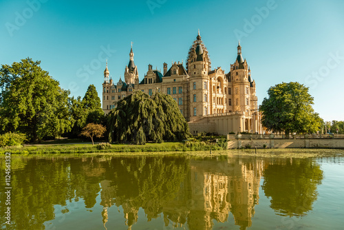 View of Schwerin Castle surrounded by lake Schwerin in Germany