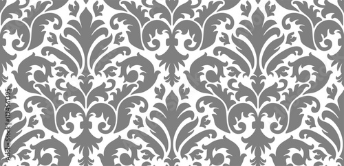 Seamless damask pattern with repeating floral motifs in grayscale for sophisticated designs.