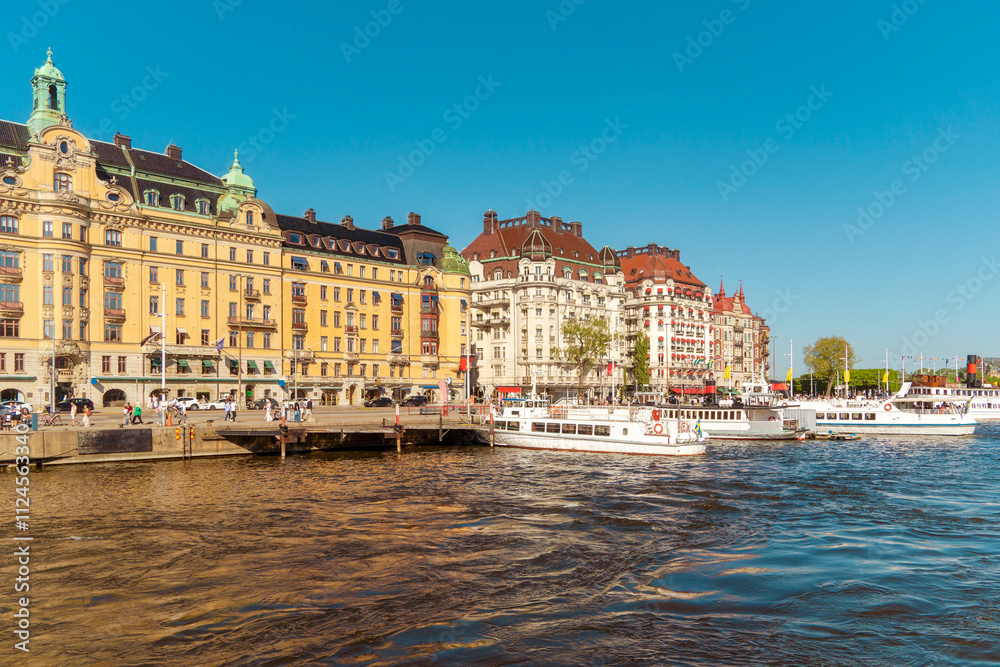 Strandvagen promenade in Ostermalm city center with boats and ferries, Stockholm, Sweden, nobody. Strandvagen promenade in Ostermalm city center with boats and ferries, Stockholm, Sweden, nobody.