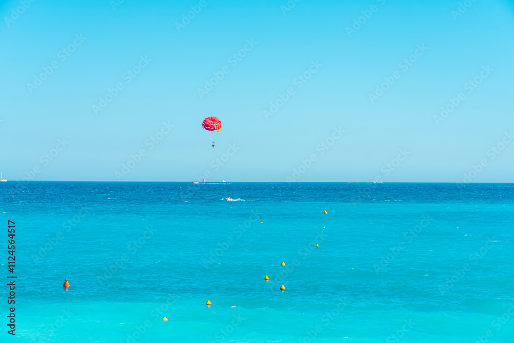 Parasurfing by the beach of Nice on the Mediterranean Sea. Parasurfing by the beach of Nice on the Mediterranean Sea.