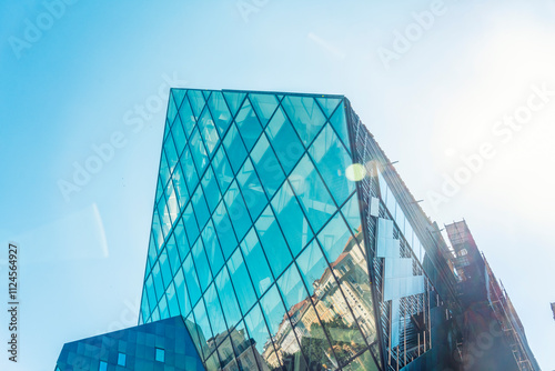 Modern glass building in cubic form in Nice, France photo