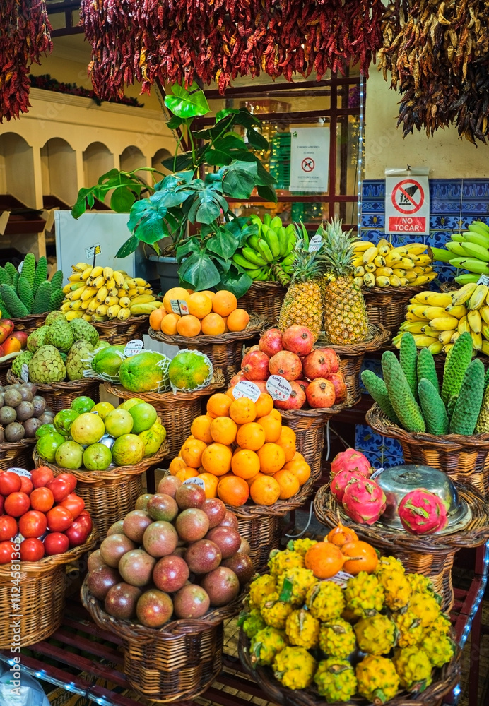 Colorful display of exotic fruits and vegetables at Mercado dos Lavradores in Funchal, Madeira, Portugal Colorful display of exotic fruits and vegetables at Mercado dos Lavradores in Funchal, Madeira, Portugal
