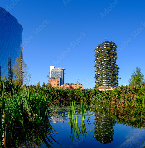 Bosco Verticale in Milan with green towers and reflection in a pond photo