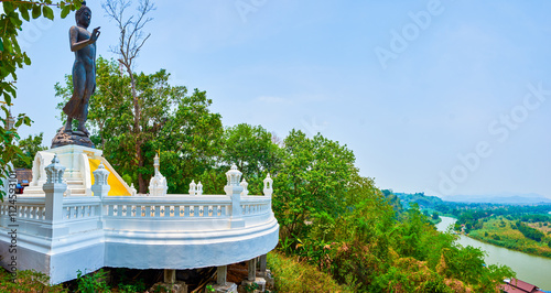 Phra Buddha Sirirat the Statue to Buddha atop the hill in Ban Sop Ruak, Thailand photo