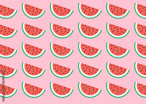 Watermelon slices arranged in a colorful repeating pattern on a pink background photo