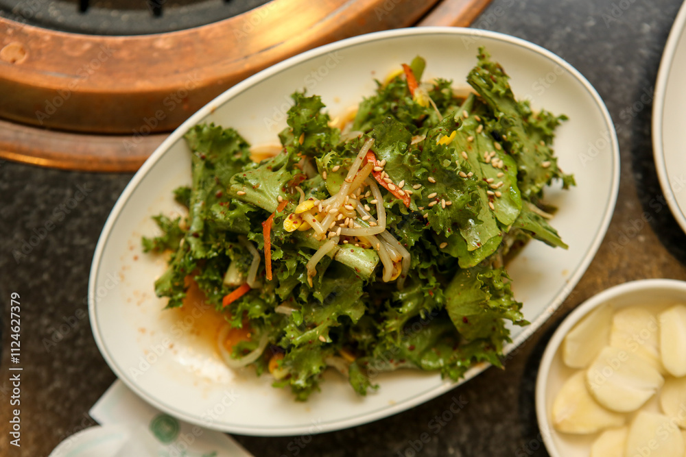 lettuce salad seasoned with soy sauce. Korea food lettuce salad seasoned with soy sauce. Korea food