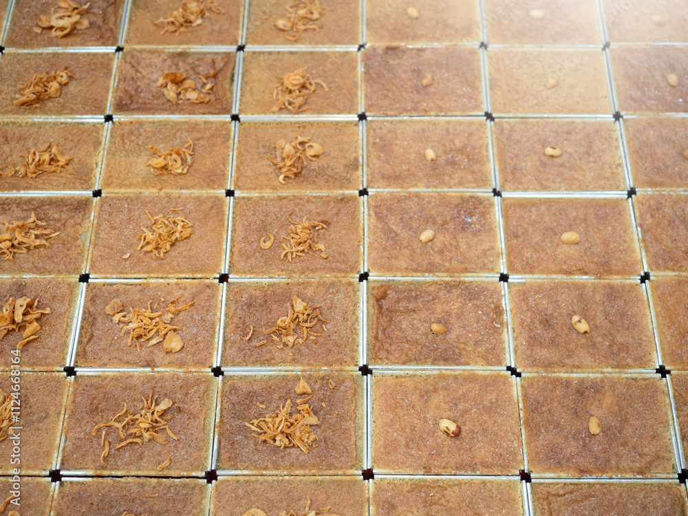 Khanom Mo Kaeng, traditional Thai baked sweet dessert with coconut custard pudding.
