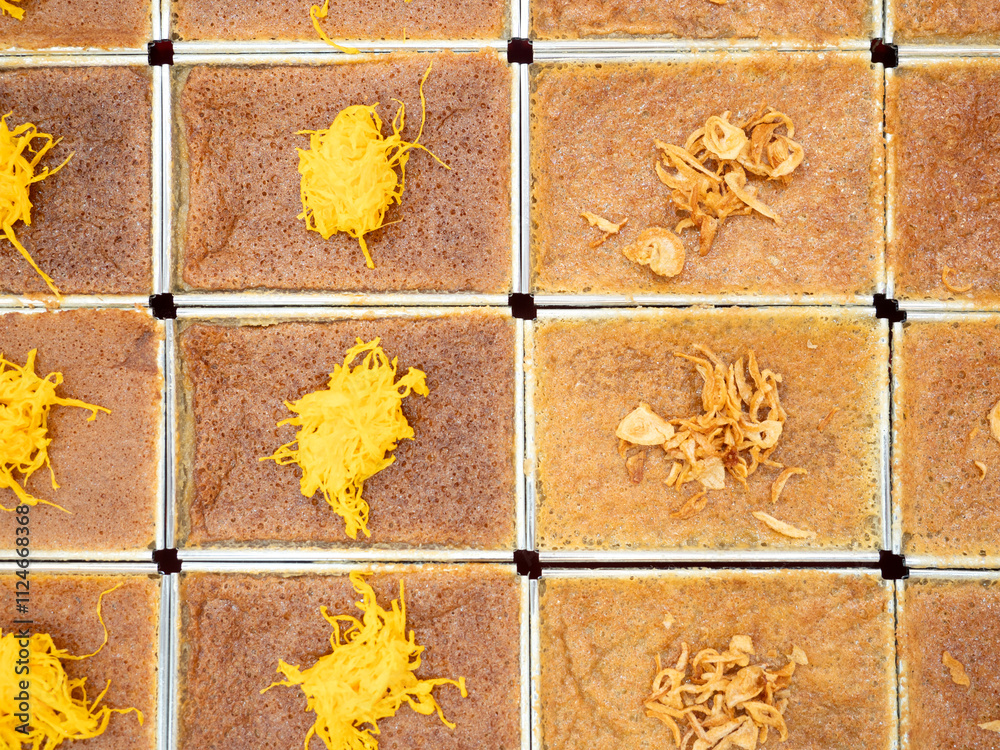 Khanom Mo Kaeng, traditional Thai baked sweet dessert with coconut custard pudding.
