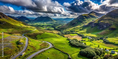 Aerial View of Winding Road Through Molls Gap with Owenreagh River Valley and Scenic MacGillycuddys Reeks Mountains in the Heart of Wild Atlantic Way, Ring of Kerry, Ireland photo