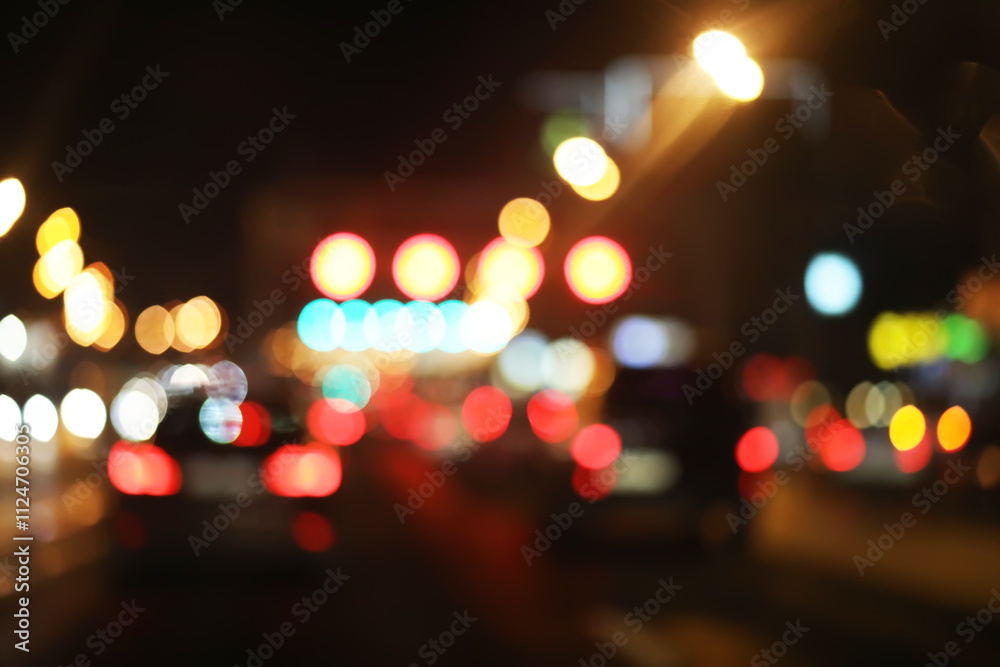 De focused/blur image of city at night. De focused, blurred urban abstract traffic background.