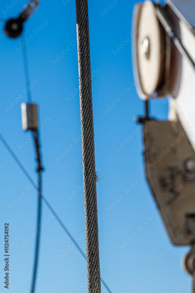 Artistic and creative composition with a metal rope on a ferry boat. Artistic and creative composition with a metal rope on a ferry boat.