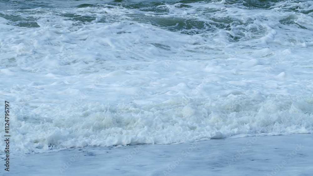 Storm Wave In Sea. Dark Sea Ocean Surface. Splashes Of Water From Waves Breaking. Slow motion.