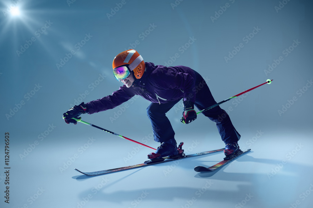 Controlled carve of skier showcases agility, as glide smoothly across studio skis against t light blue gradient backdrop. Studio shooting. Concept of extreme sport, Christmas holidays. Ad Controlled carve of skier showcases agility, as glide smoothly across studio skis against t light blue gradient backdrop. Studio shooting. Concept of extreme sport, Christmas holidays. Ad