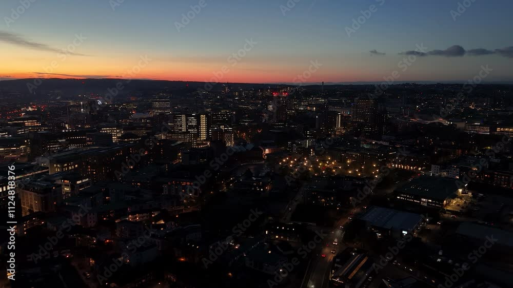 Aerial drone view of illuminated Bristol town center cityscape at sunset Aerial drone view of illuminated Bristol town center cityscape at sunset