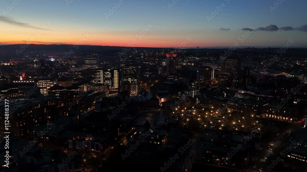 Aerial drone view of illuminated Bristol cityscape town center at sunset Aerial drone view of illuminated Bristol cityscape town center at sunset
