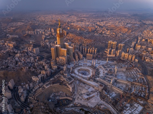Aerial view of the Grand Mosque with the Kaaba, Islam’s holiest site, and the Abraj Al-Bait Clock Tower illuminated by early morning sunlight in the holy city of Mecca