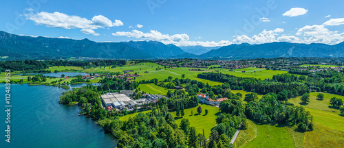 Ausblick auf das Alpenvorland nahe Murnau am idyllisch gelegenen Riegsee im Sommer photo