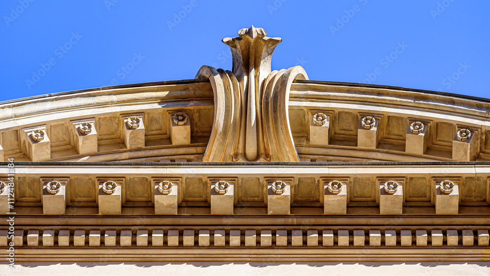 Fototapeta premium Murcia, Spain, Ancient architectural decoration on a stone wall of an ancient building