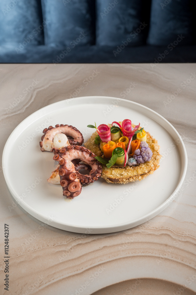 grilled octopus on fried breaded aubergine and vegetable salad grilled octopus on fried breaded aubergine and vegetable salad