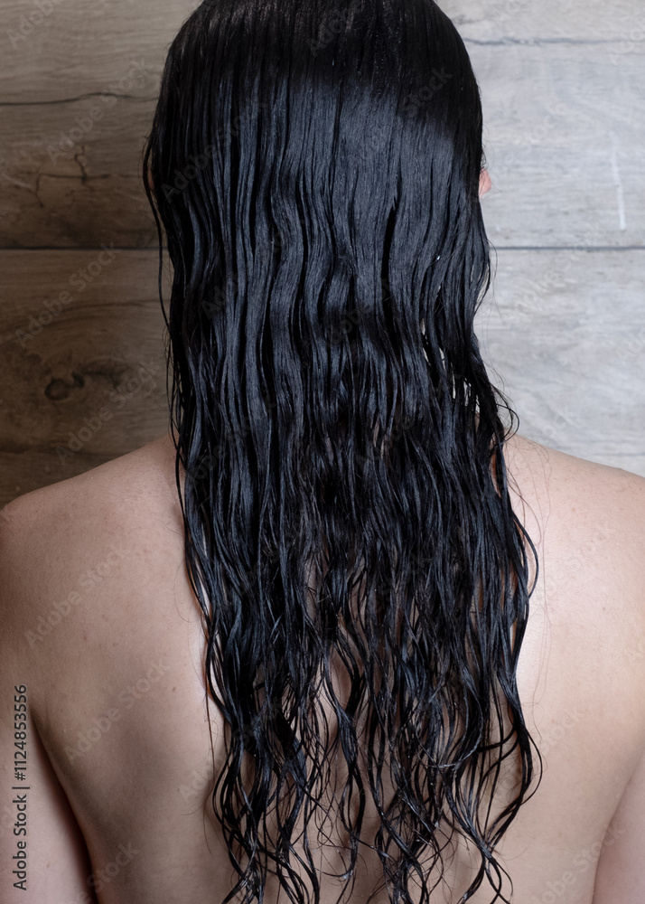 Fototapeta premium Dark curly hair after shower
