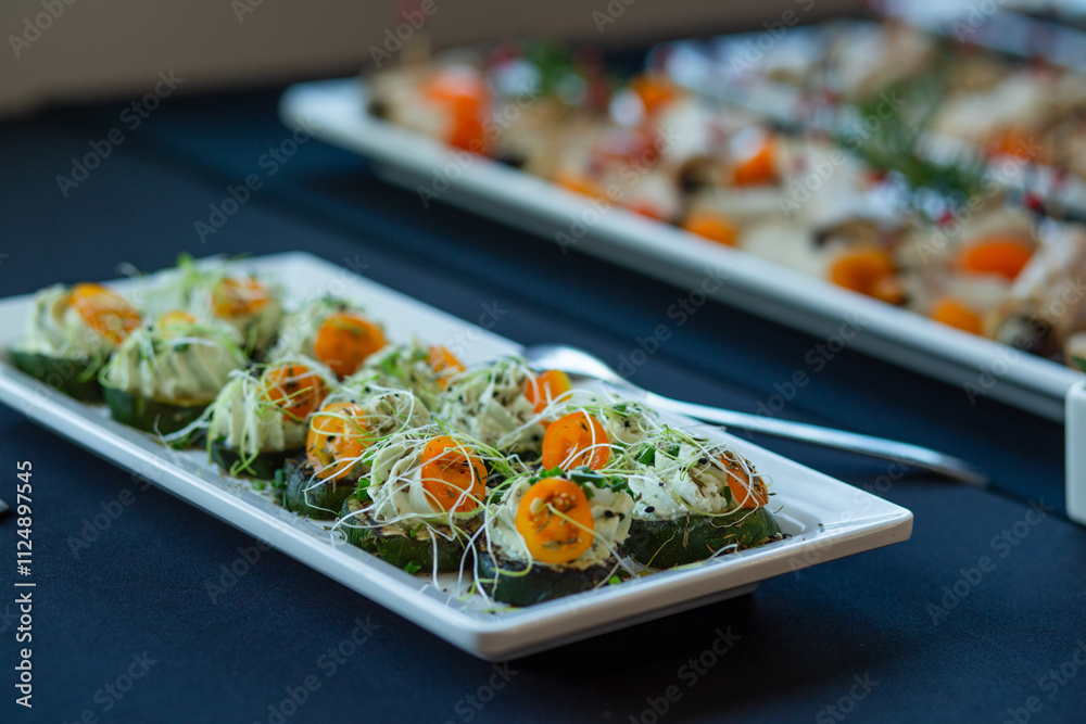catering sushi rolls with zucchini, cheese and microgreens catering sushi rolls with zucchini, cheese and microgreens