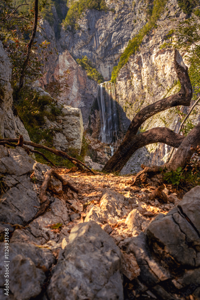Obraz premium The incredible waterfall Boka in the wild nature and beauty of the famous Triglav National Park in Slovenia.