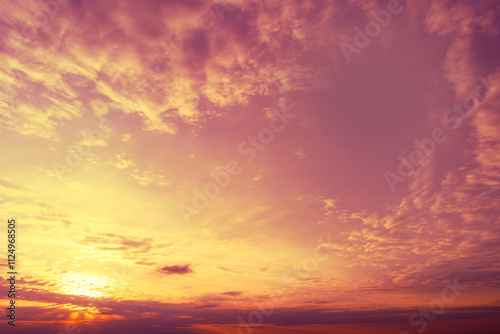 Blazing cloudy sky at sunset. Gradient color. Sky texture. Abstract nature background