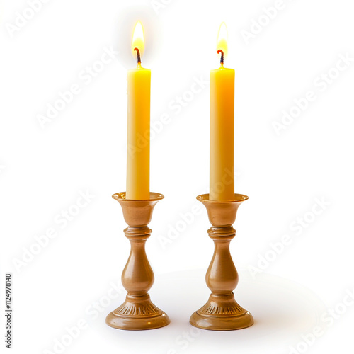 Pair of Shabbat candles in elegant candlesticks isolated on a white background. photo