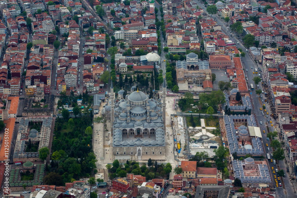 View from an airplane of Istanbul, the largest city in Turkey on the shores of the Bosphorus Strait, which divides it into European and Asian parts. View from an airplane of Istanbul, the largest city in Turkey on the shores of the Bosphorus Strait, which divides it into European and Asian parts.
